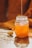 clear glass jar with orange liquid