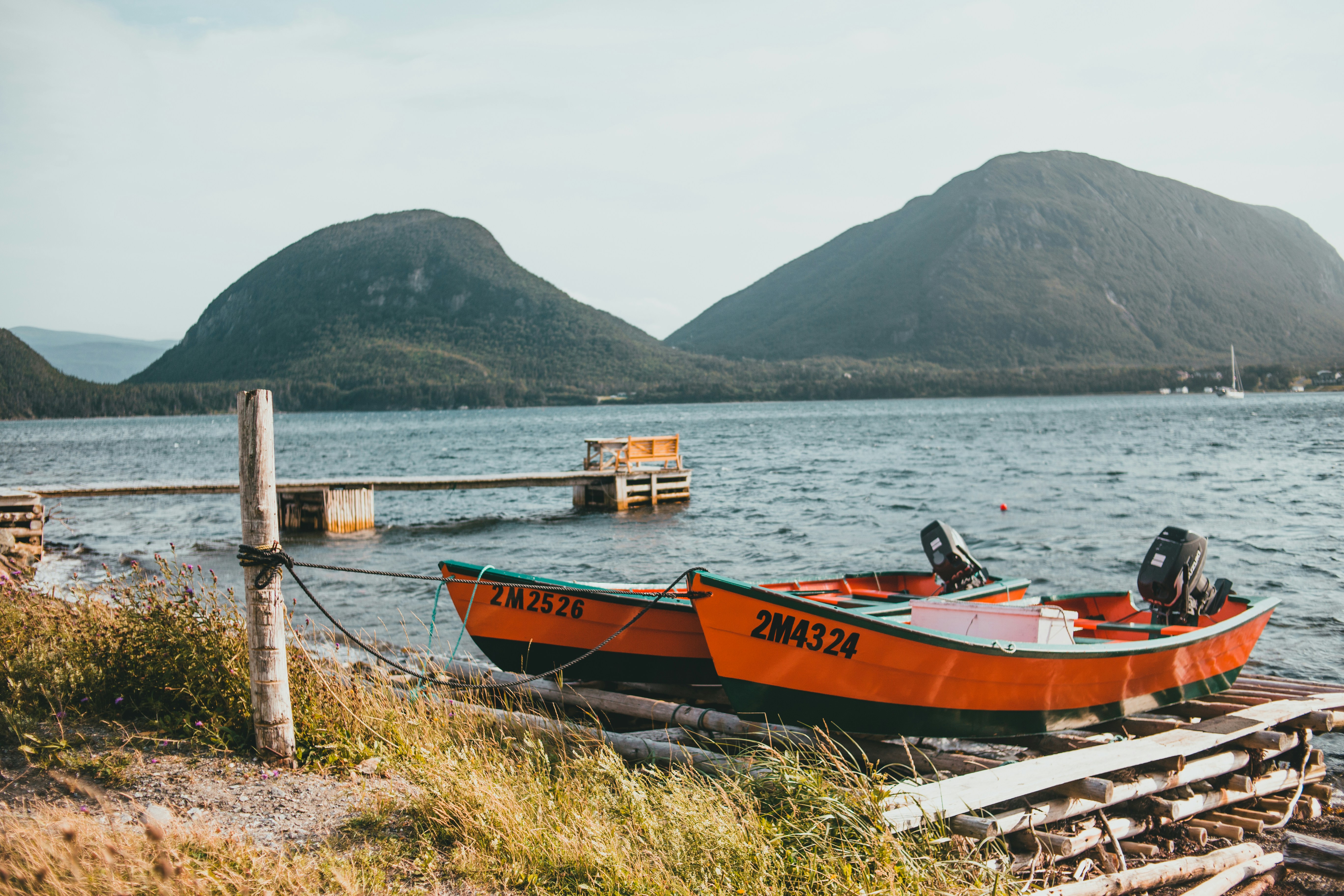 Red and brown boat on body of water during daytime photo – Free Boat ...