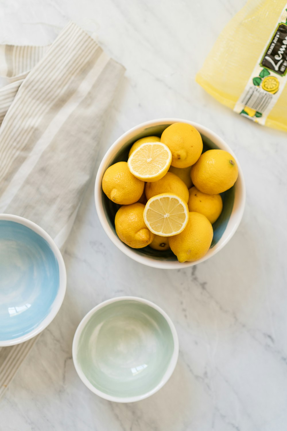 sliced lemon on white ceramic bowl