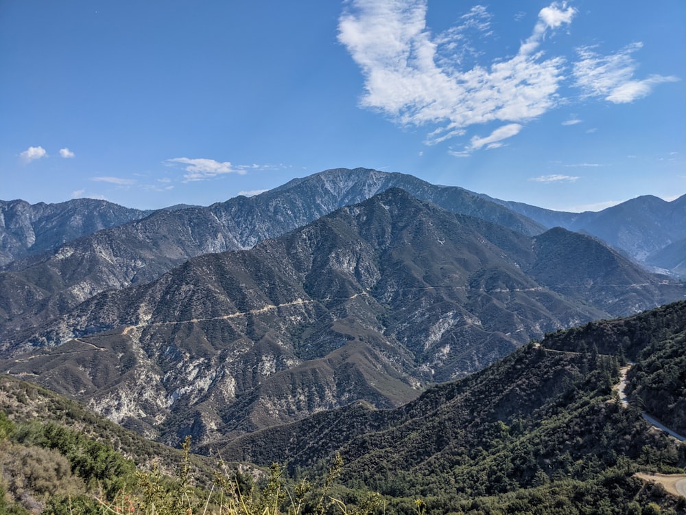 green and brown mountains under blue sky during daytime