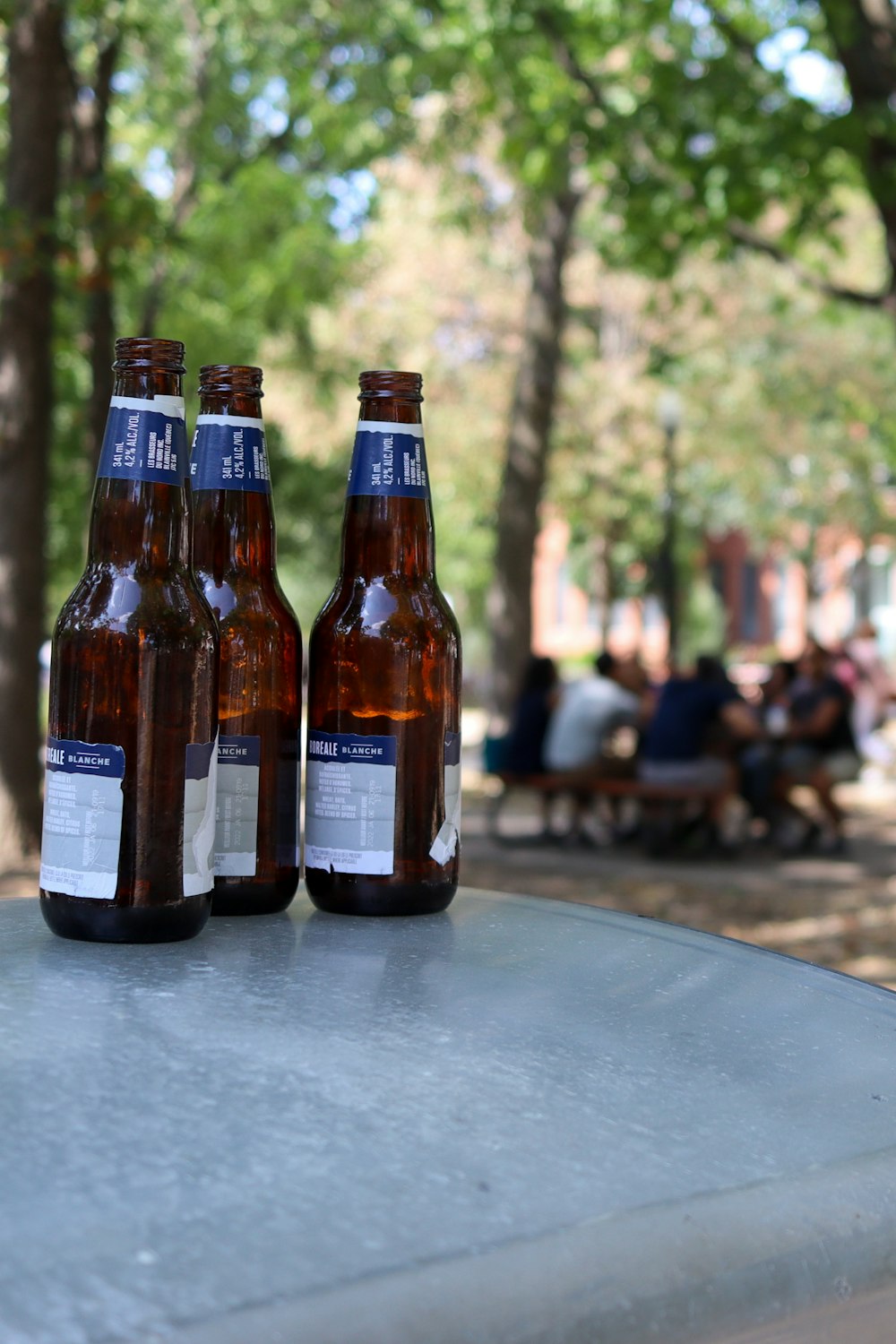 brown glass bottles on table