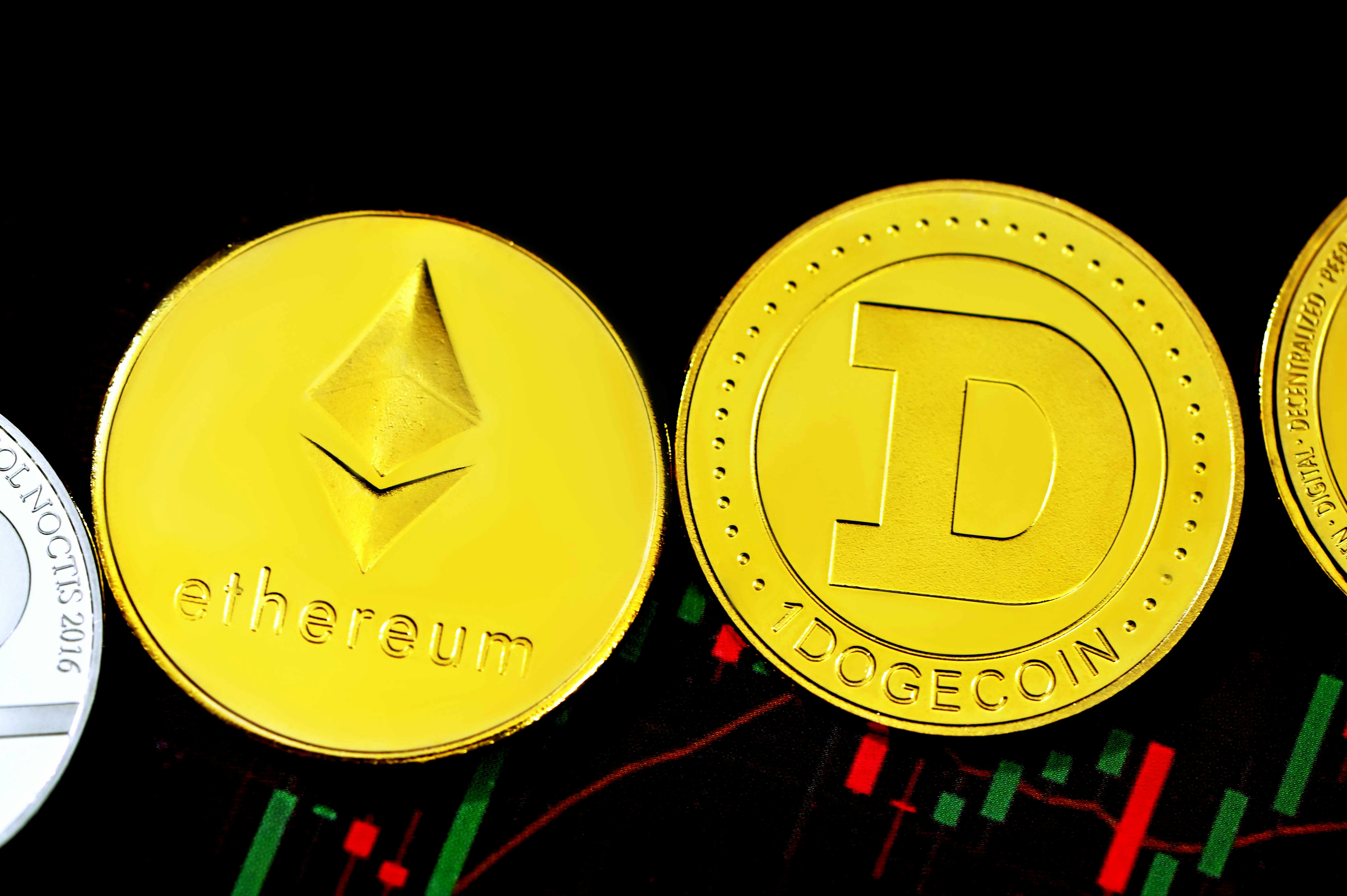 Ethereum coin and Dogecoin are together on a trading chart