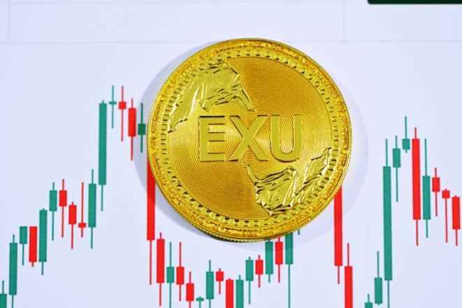 gold round coin with letter m
