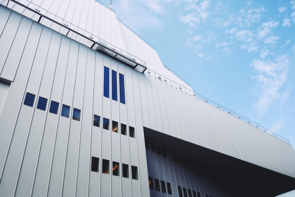 white concrete building under blue sky during daytime