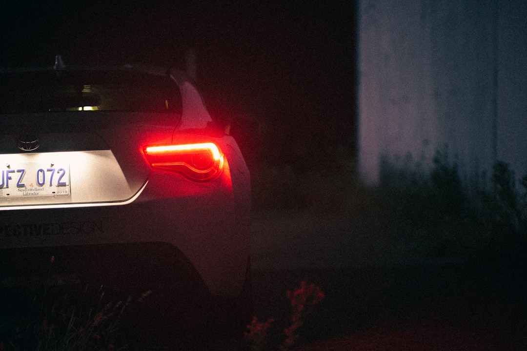 white car in a dark room