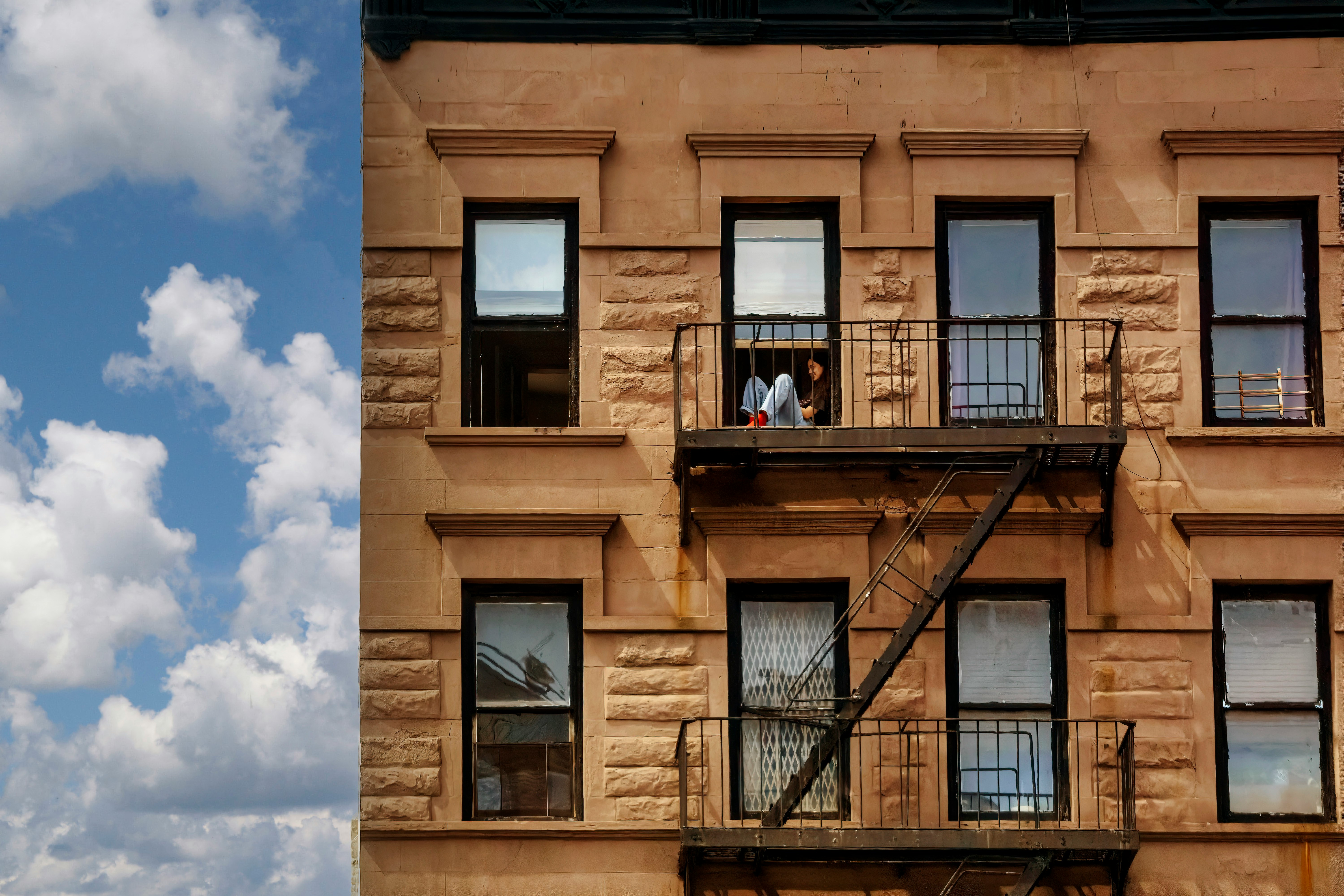 brown concrete building under blue sky during daytime