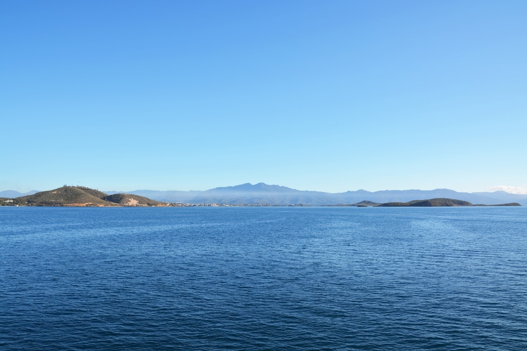 blue sea under blue sky during daytime