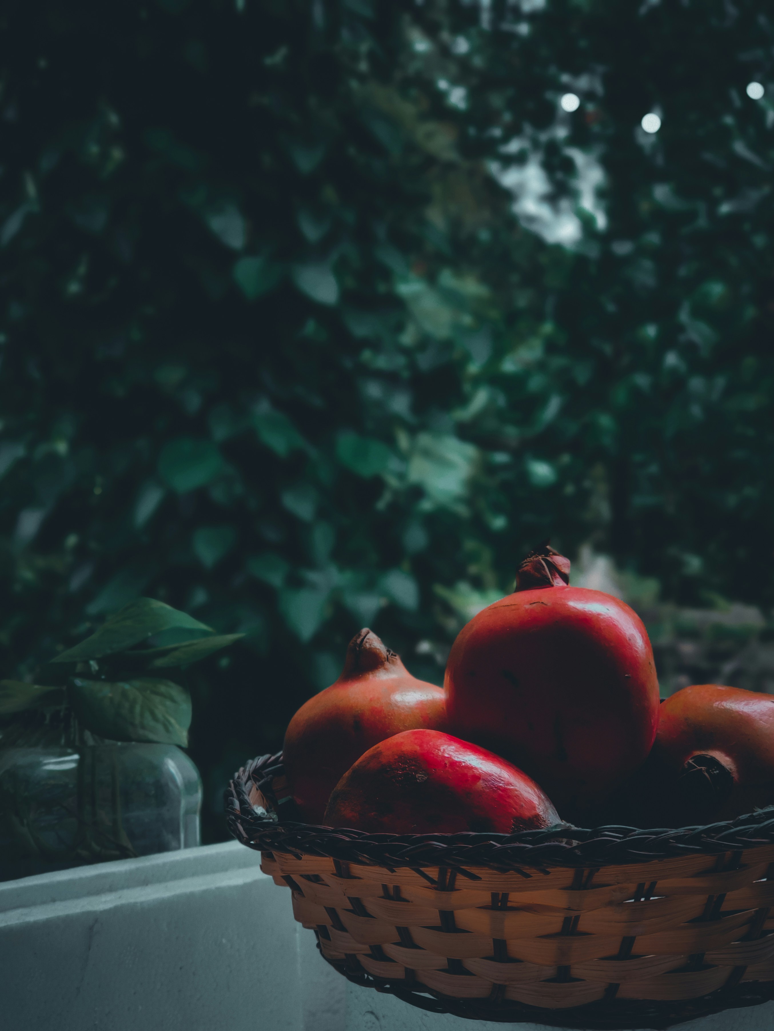 red apples on brown woven basket