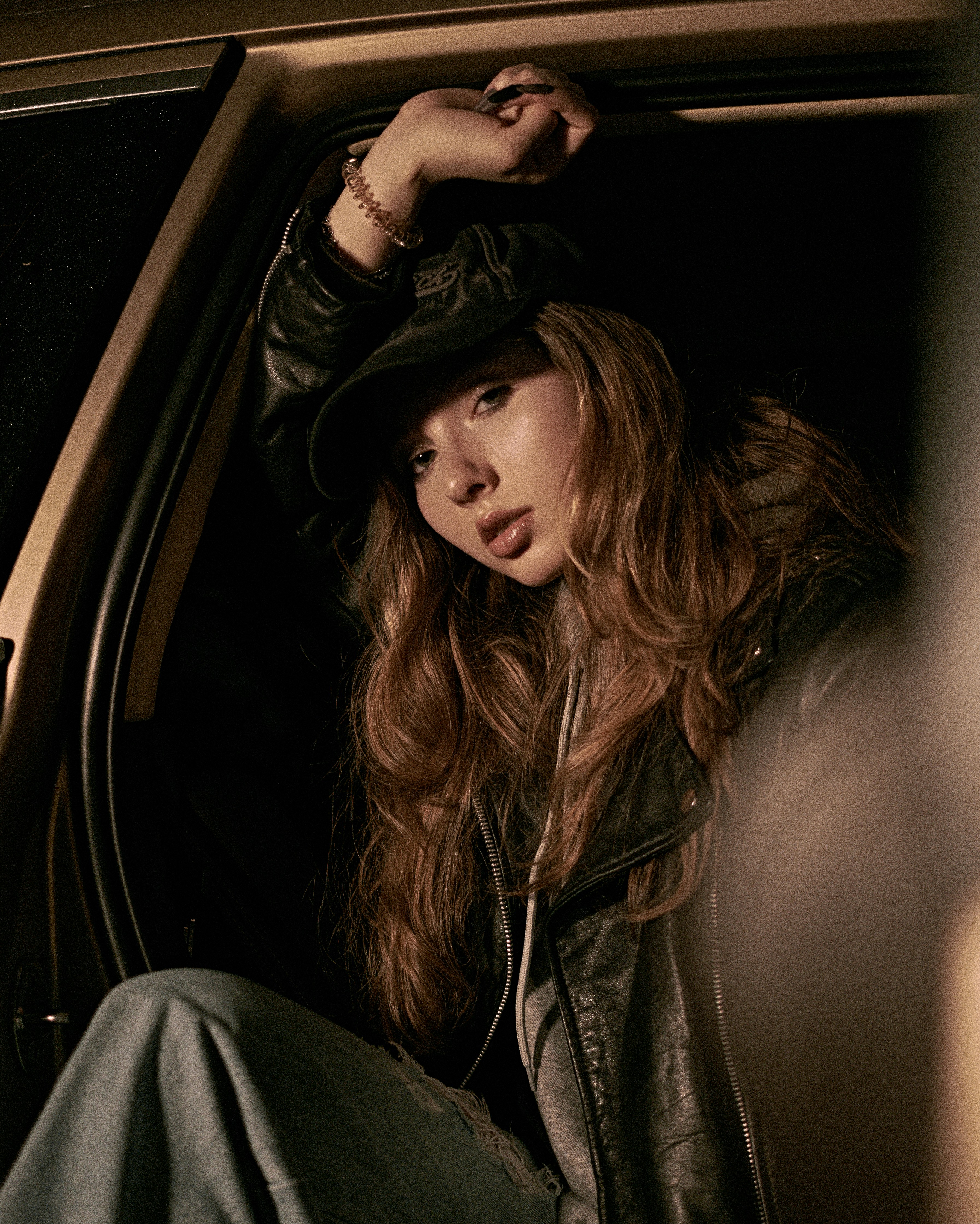 woman in black leather jacket