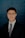 man in black suit wearing eyeglasses