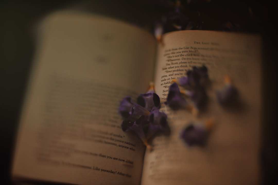 purple flower on book page