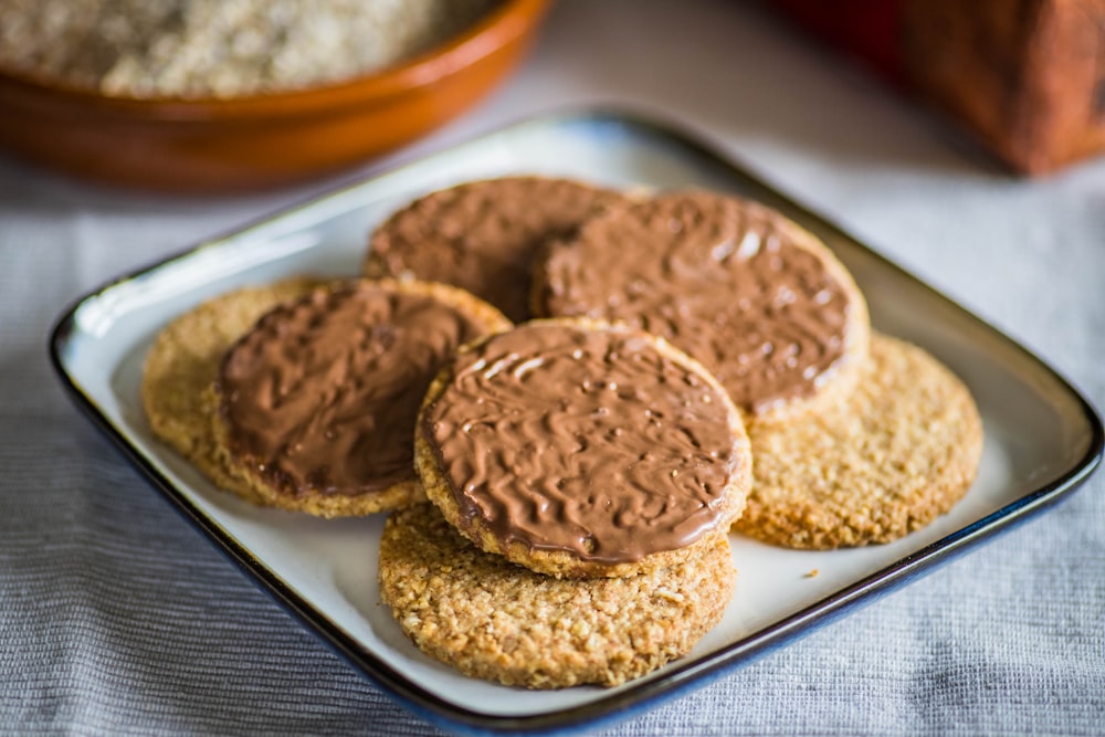 brown cookies on white ceramic plate