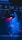 Stage lighting equipment emits vibrant beams of red and blue light, surrounded by a haze that enhances the dramatic effect. The setup includes overhead structures and cables, typical of a professional lighting rig.