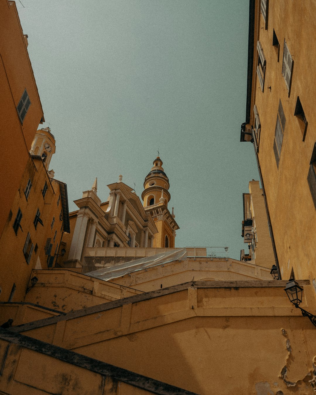 brown concrete building under blue sky during daytime