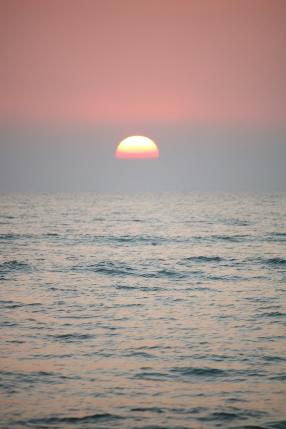 body of water during sunset