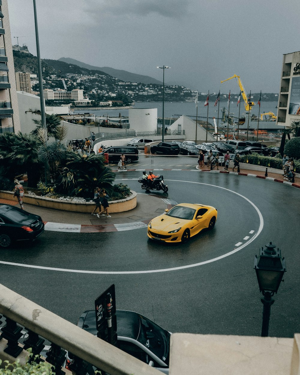 yellow ferrari sports car on road during daytime