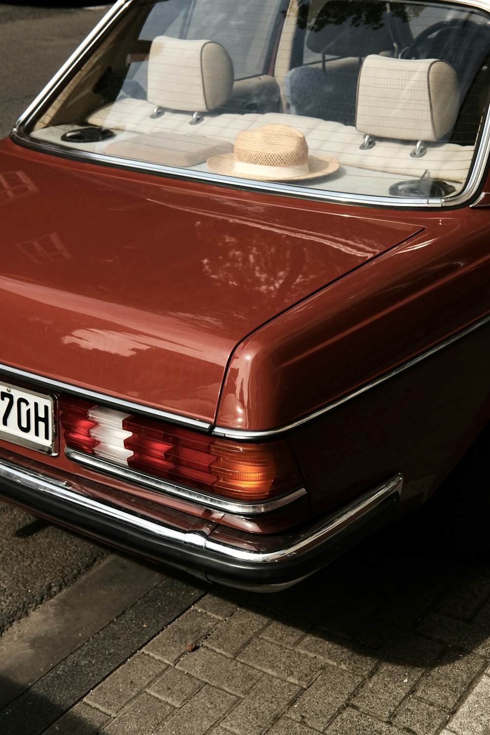 red car with brown and white ceramic plate