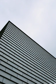 gray concrete building under white sky during daytime