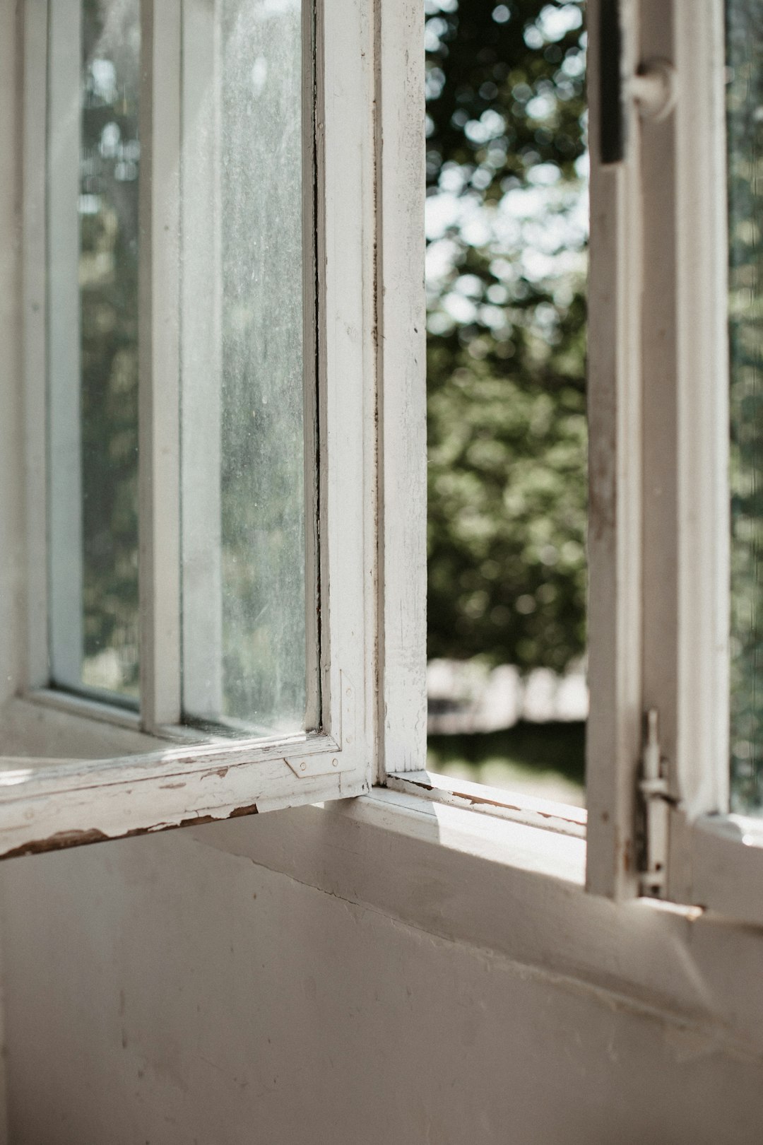 white wooden framed glass window