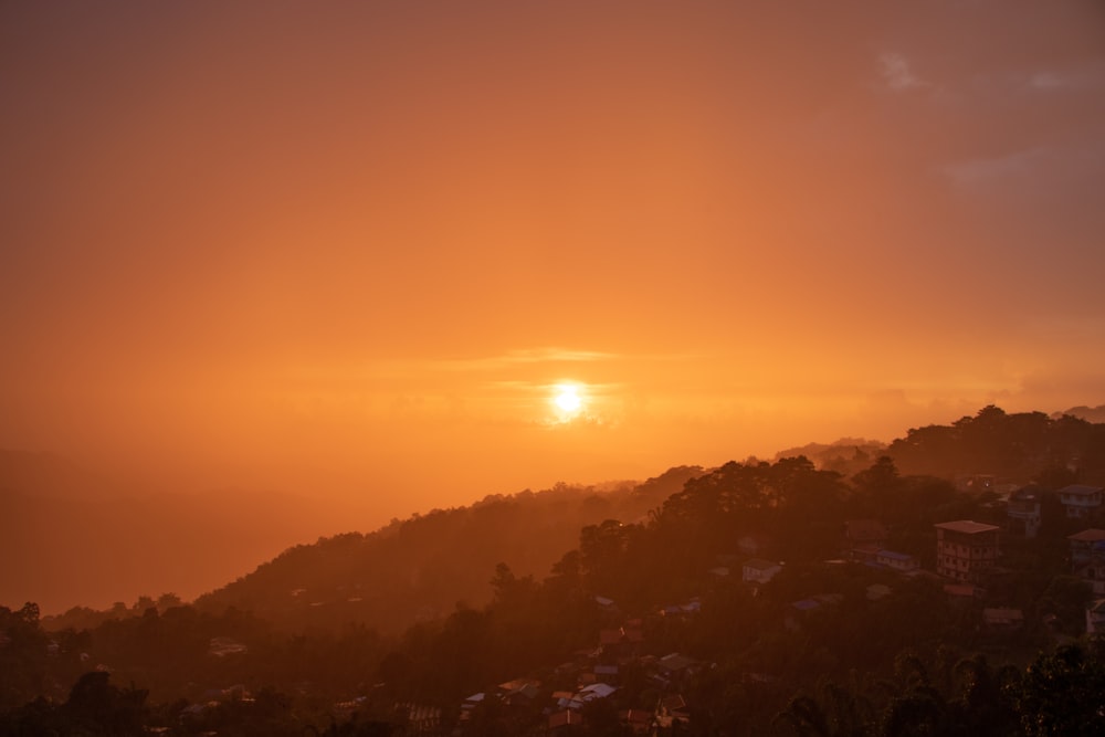 silhouette of mountains during sunset