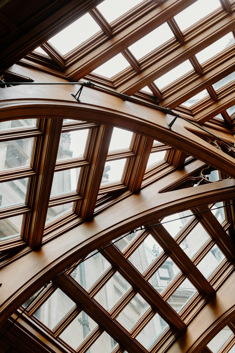 brown wooden framed glass window