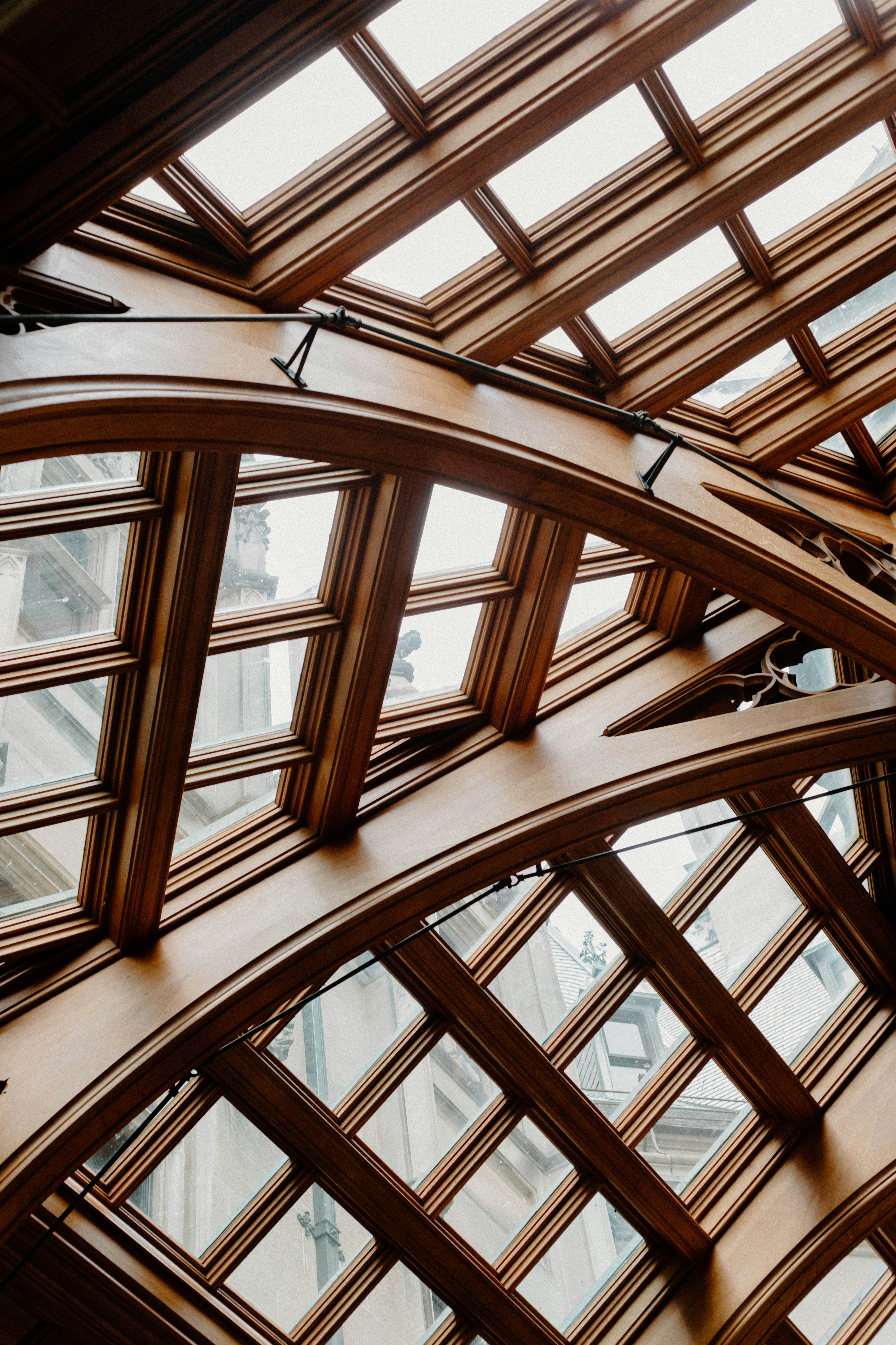 brown wooden framed glass window