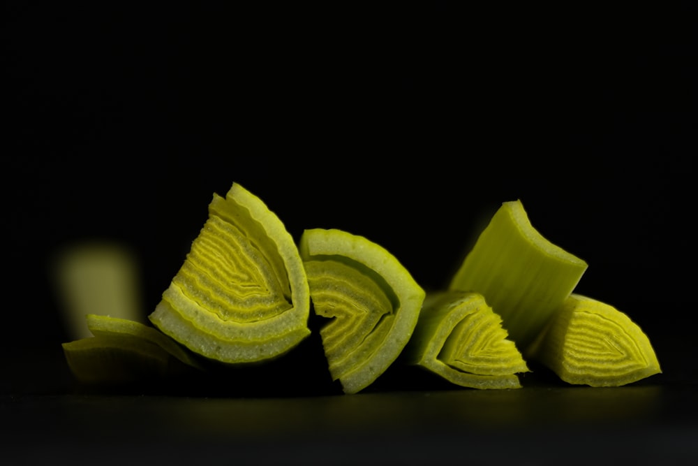 sliced lemon on black background