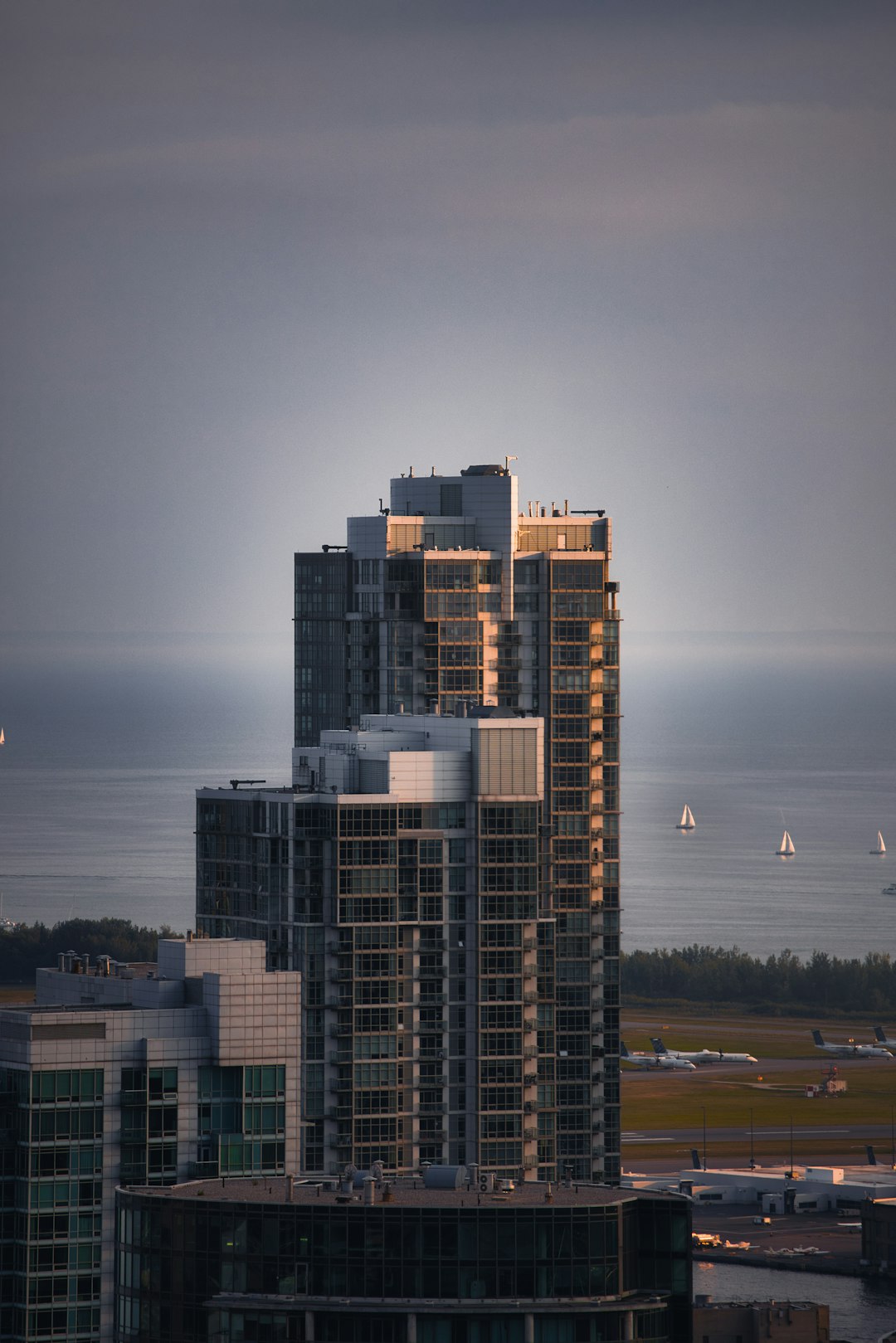 city skyline under gray sky during daytime