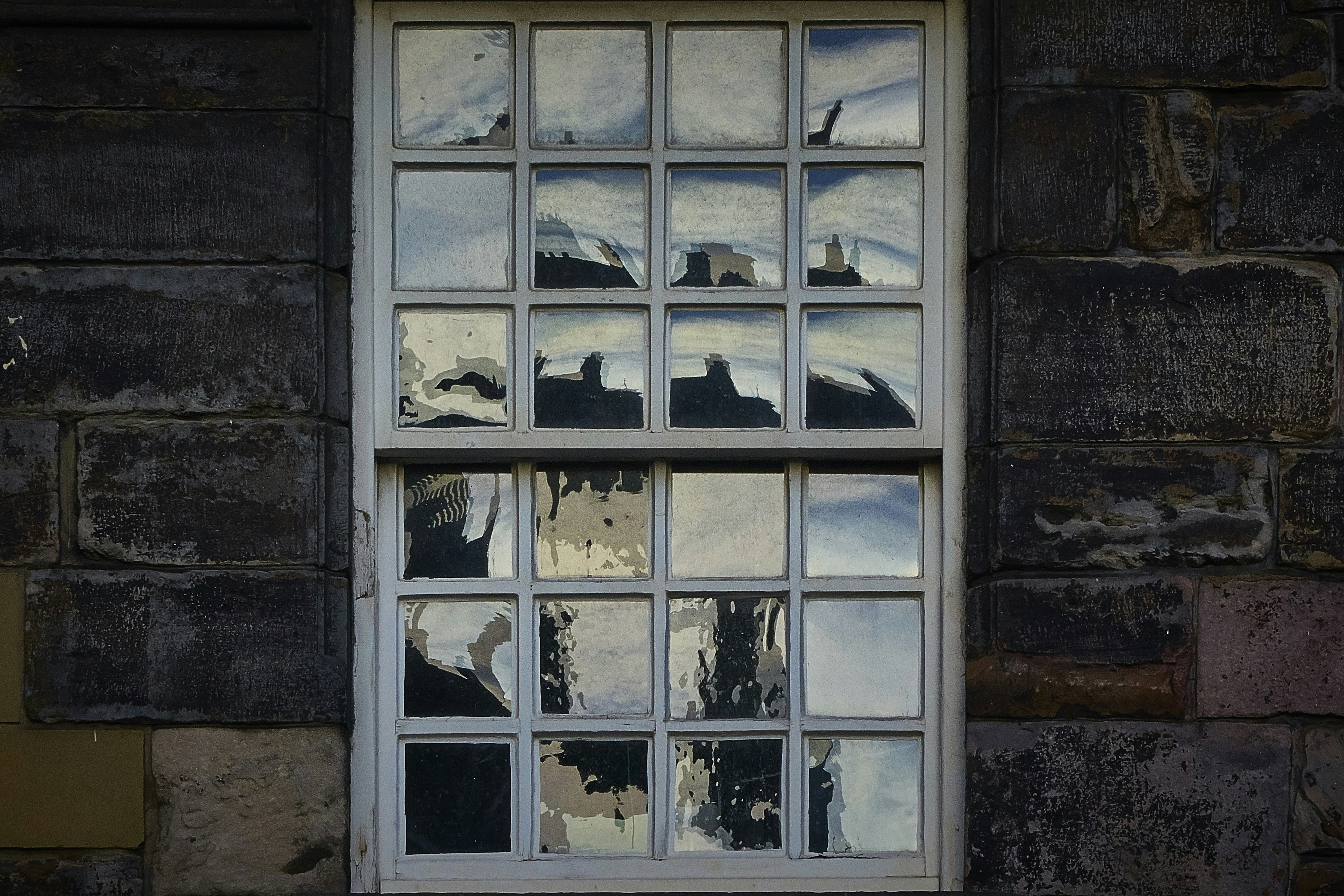 white wooden framed glass window