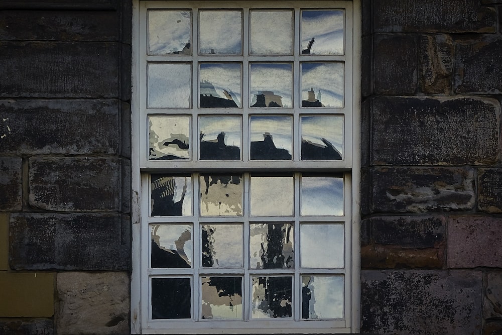 white wooden framed glass window