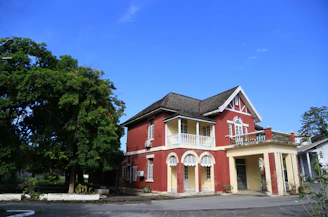 Before-and-after view of a charming old house renovated for rental purposes.
