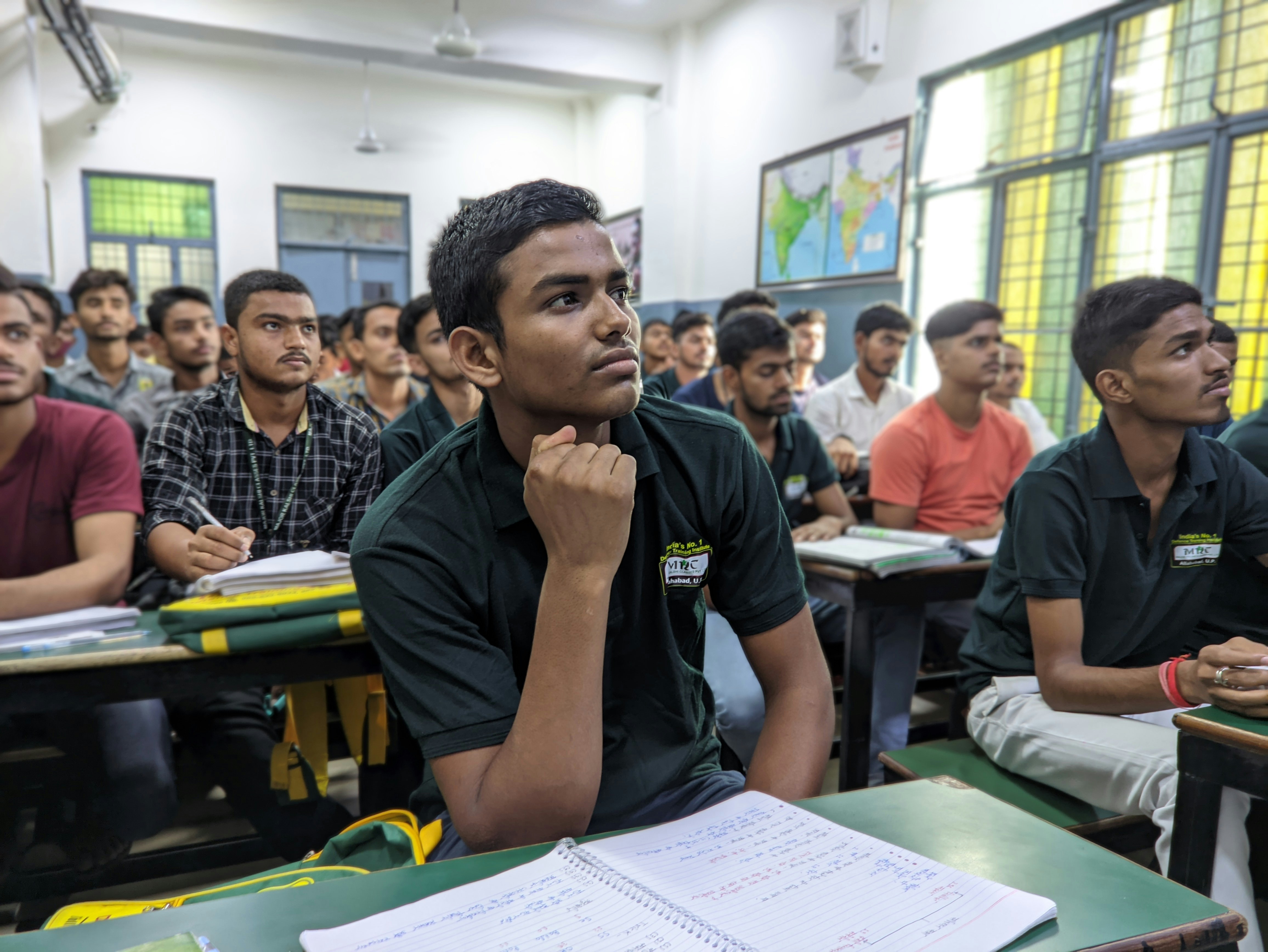 Students collaborating in class