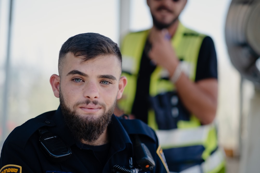 man in black polo shirt