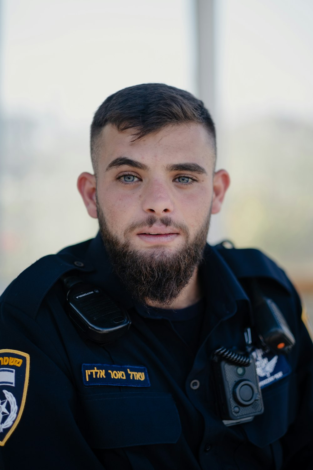 man in black jacket smiling