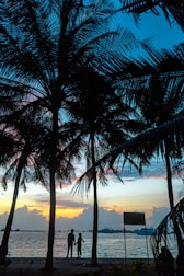 Couple enjoying a romantic sunset cruise near Palm Jumeirah.