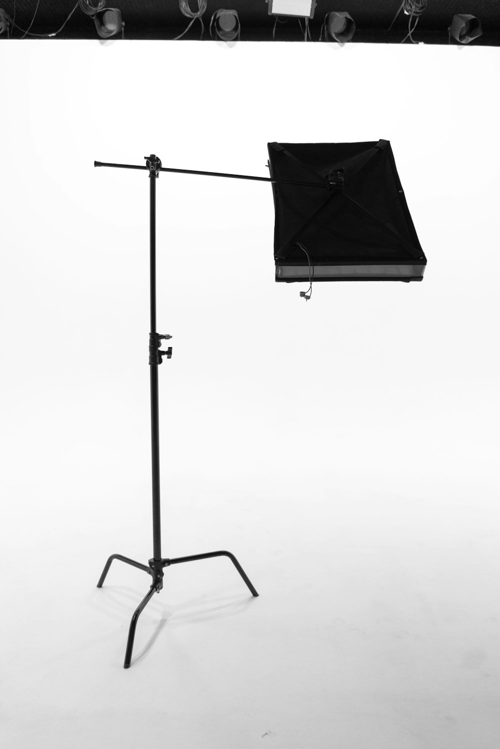 black metal stand with black umbrella