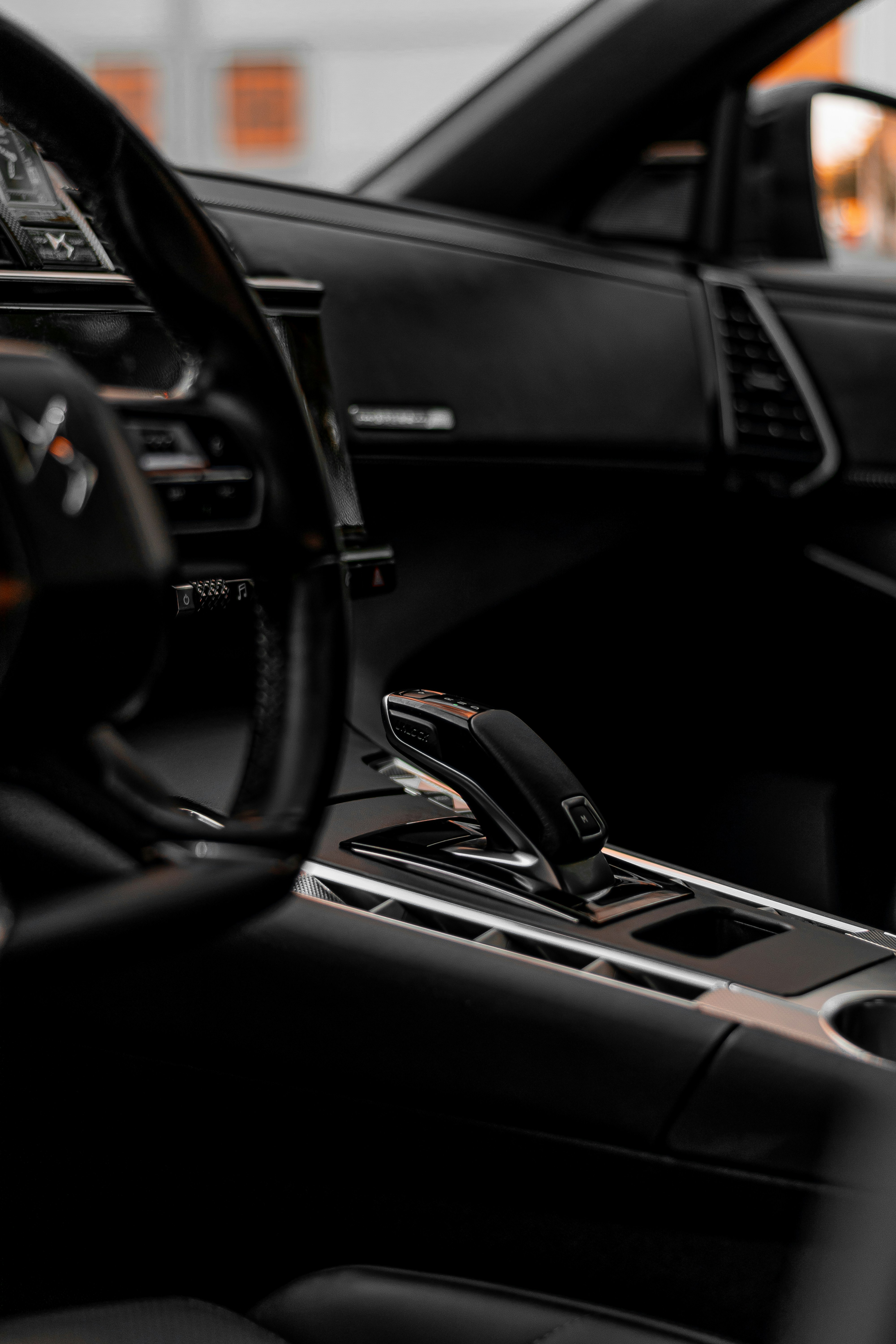 black and silver car steering wheel