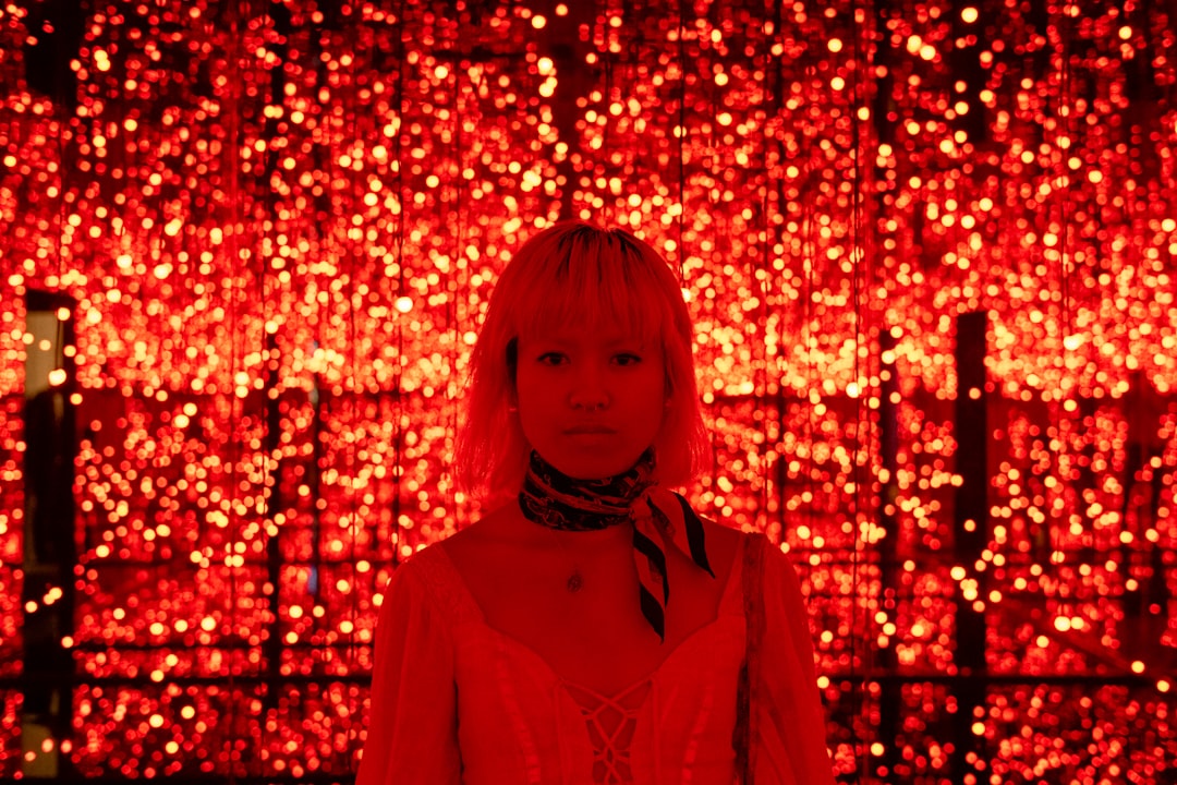 woman in red long sleeve shirt, @dannylines.visuals for more content