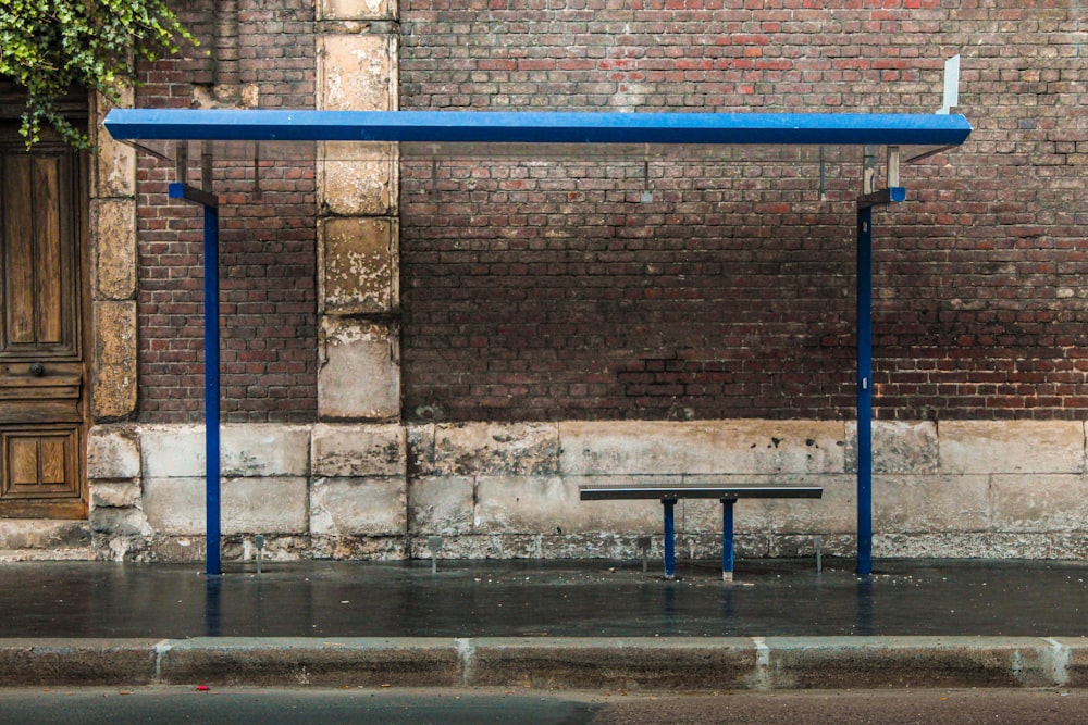 blue metal pipe on water