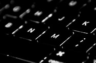 black computer keyboard in close up photography