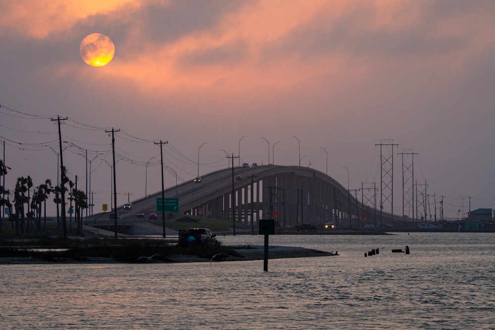 silhouette of bridge during sunset