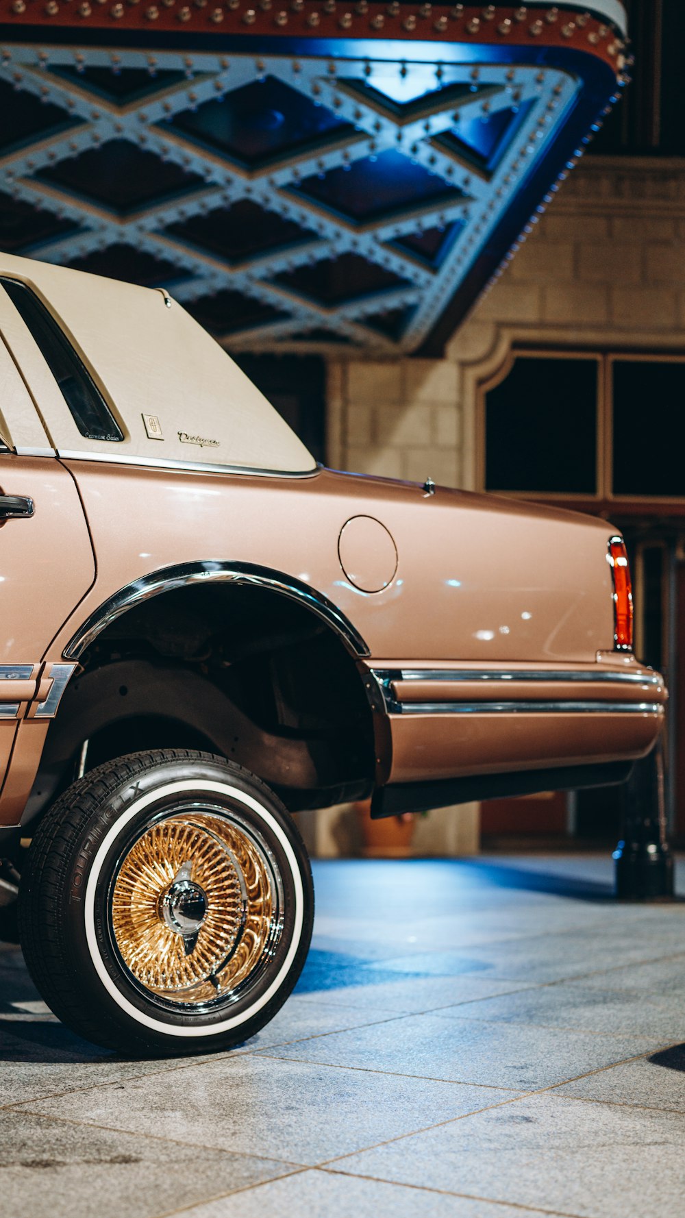 white and brown vintage car