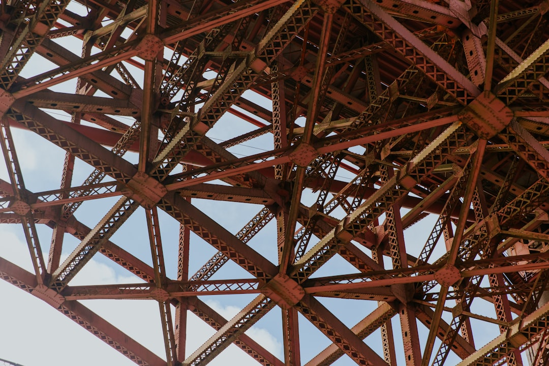 red metal tower during daytime,