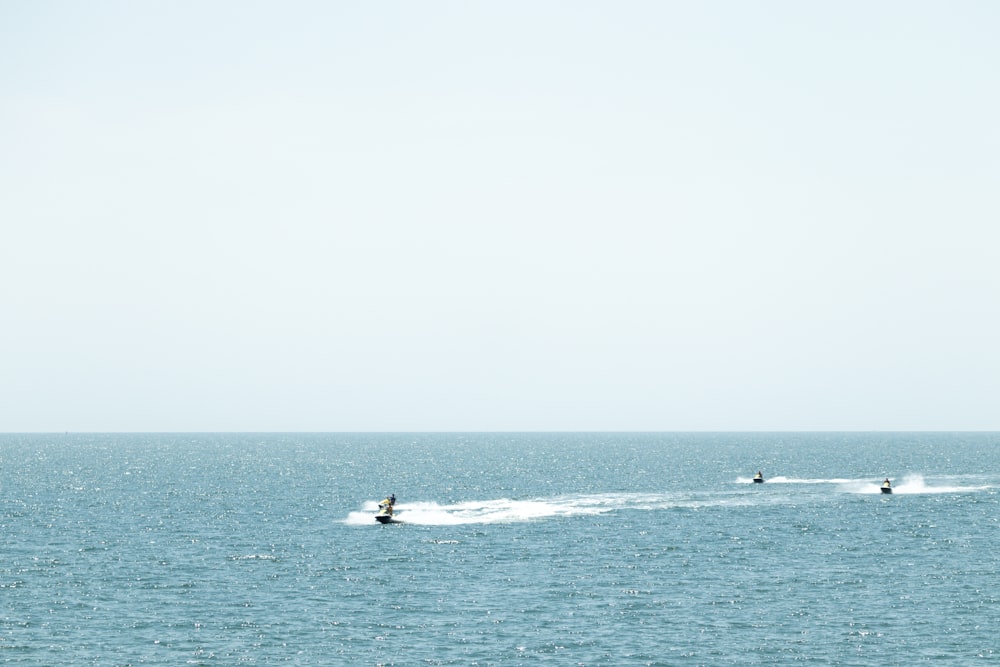 person surfing on sea during daytime