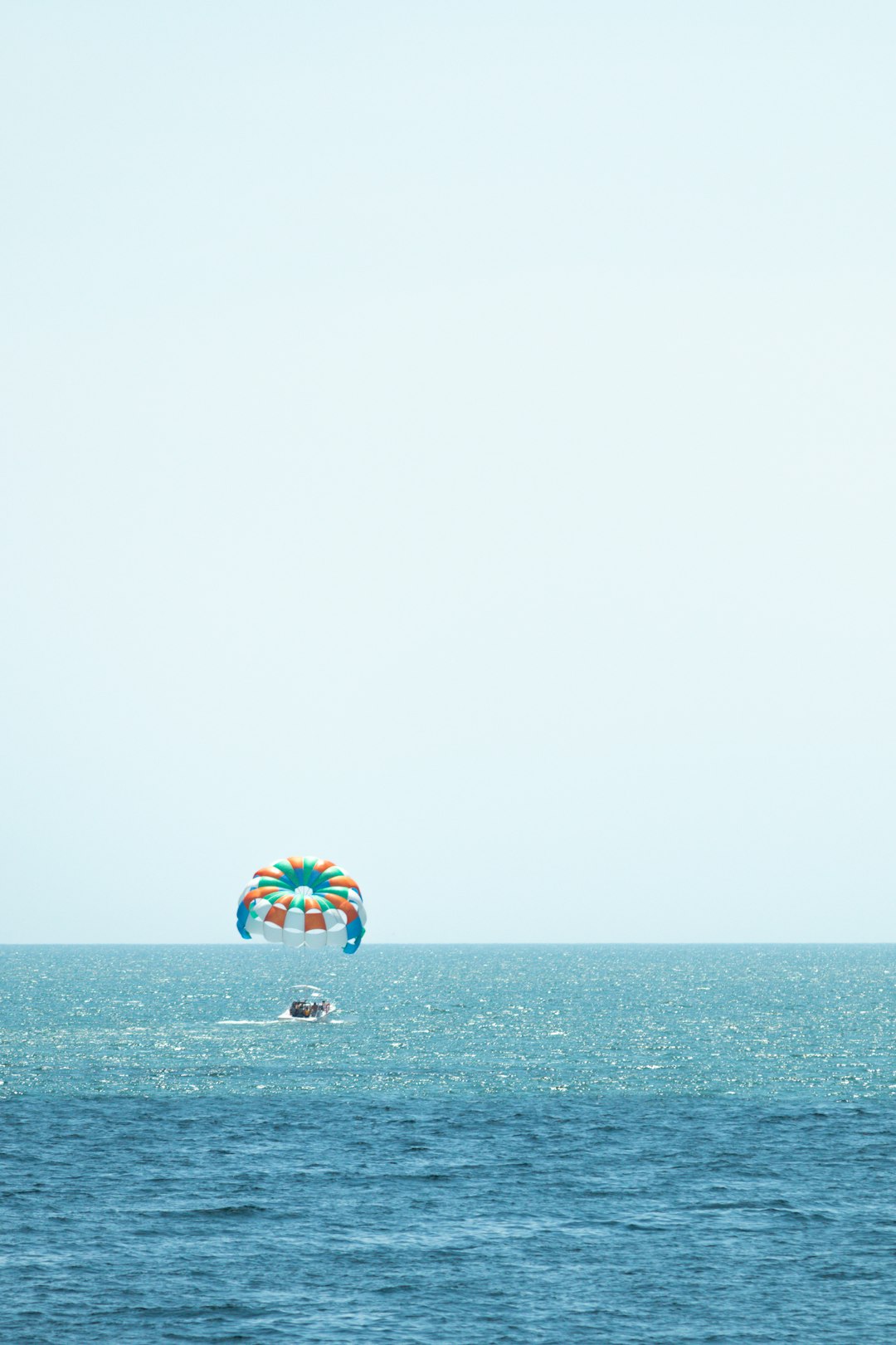 person surfing on sea during daytime