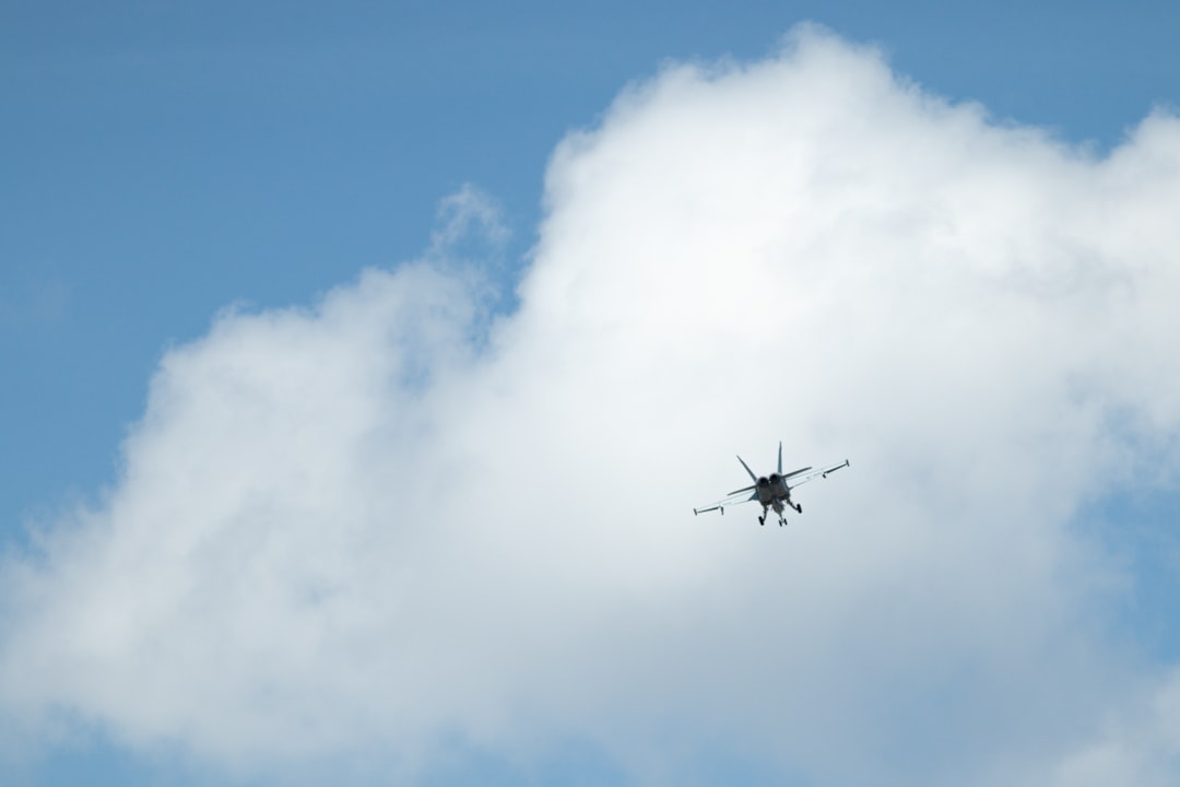 airplane flying in the sky during daytime