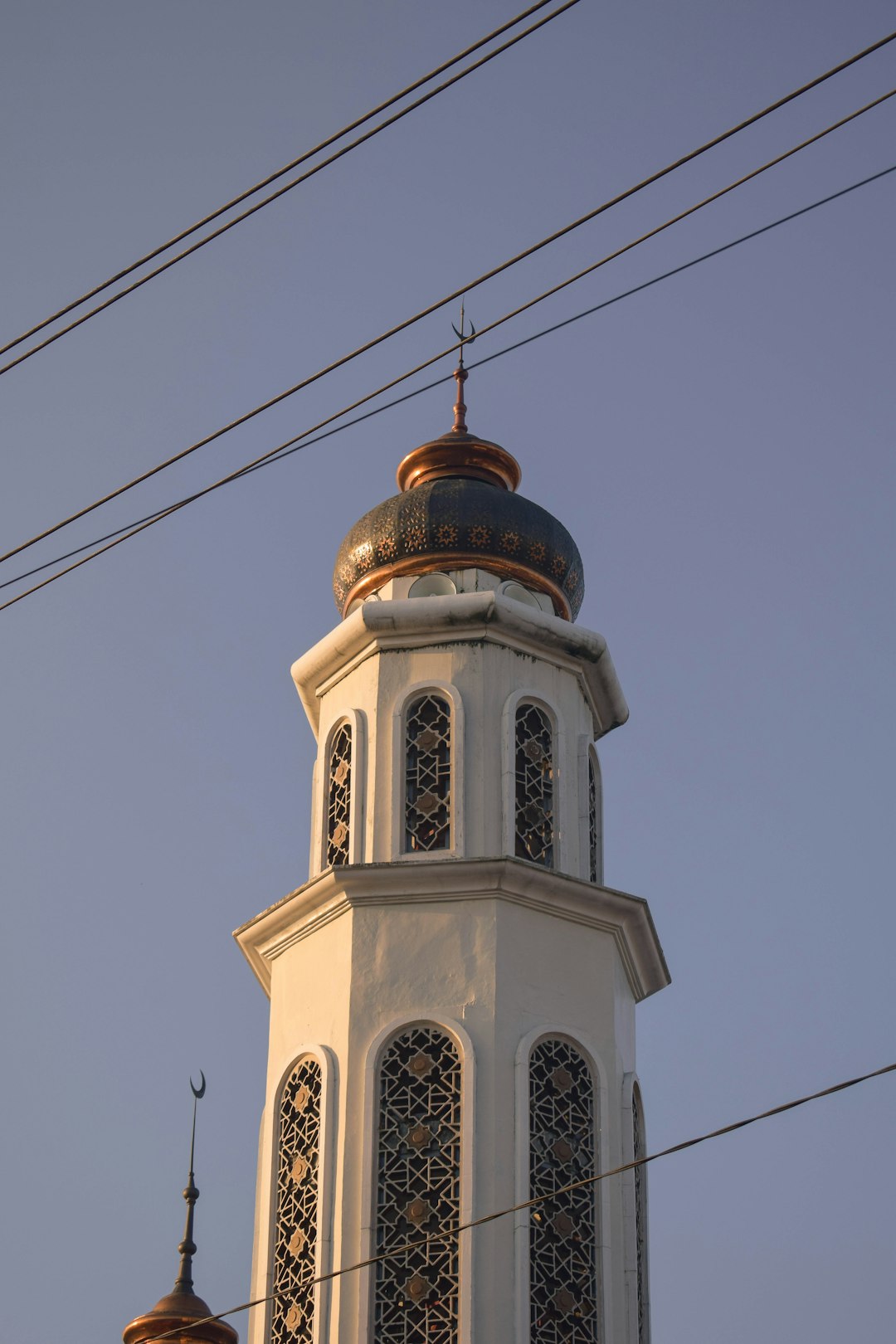 white and brown concrete building under blue sky during daytime