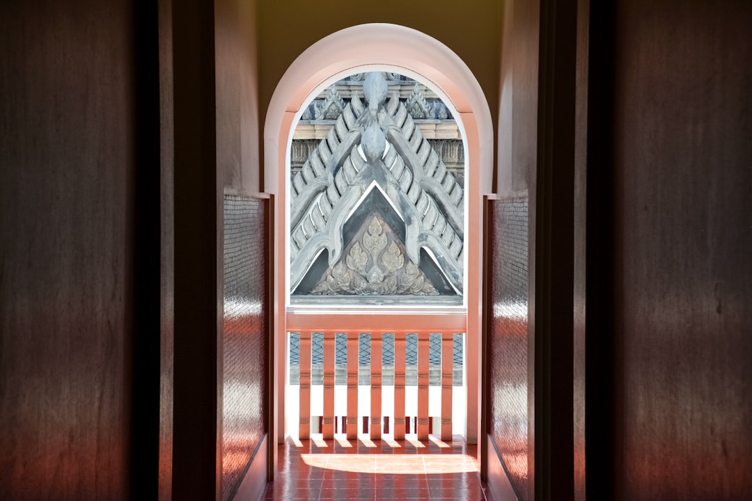 brown wooden framed glass window