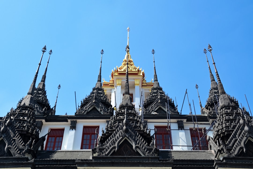 white and gold temple under blue sky during daytime