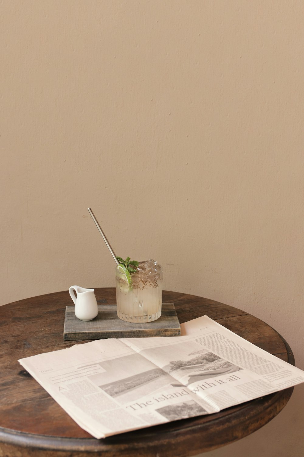 white ceramic mug on brown wooden table